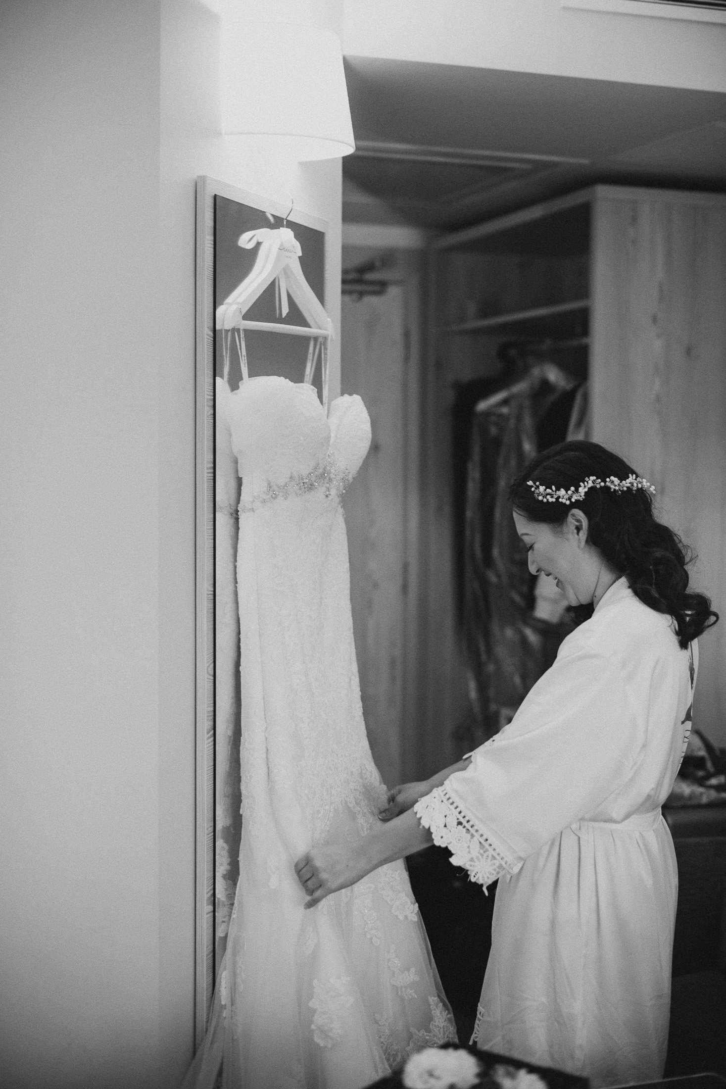 Bride looking at wedding Dress