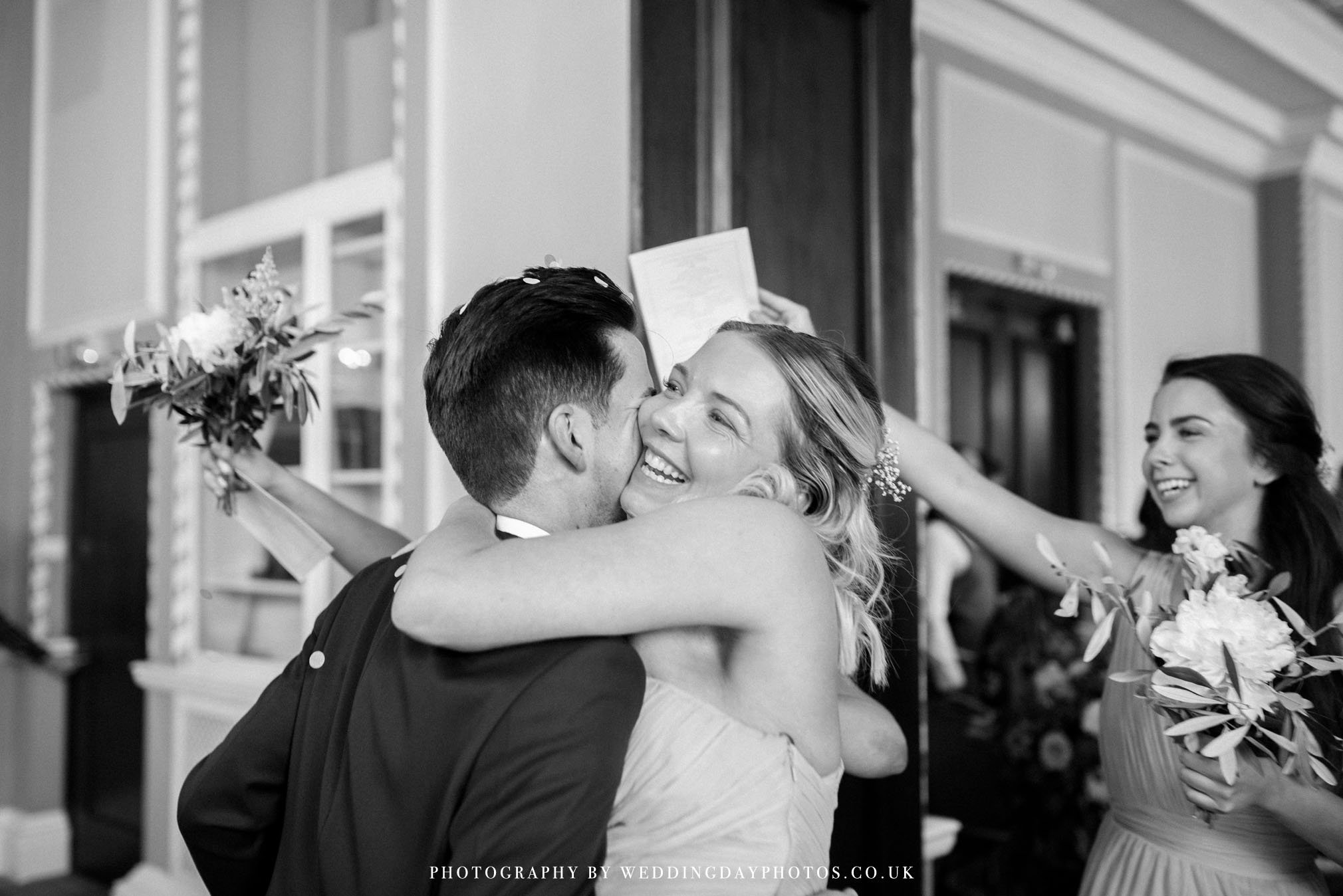 wedding guests congratulating the newlyweds at manchester hall