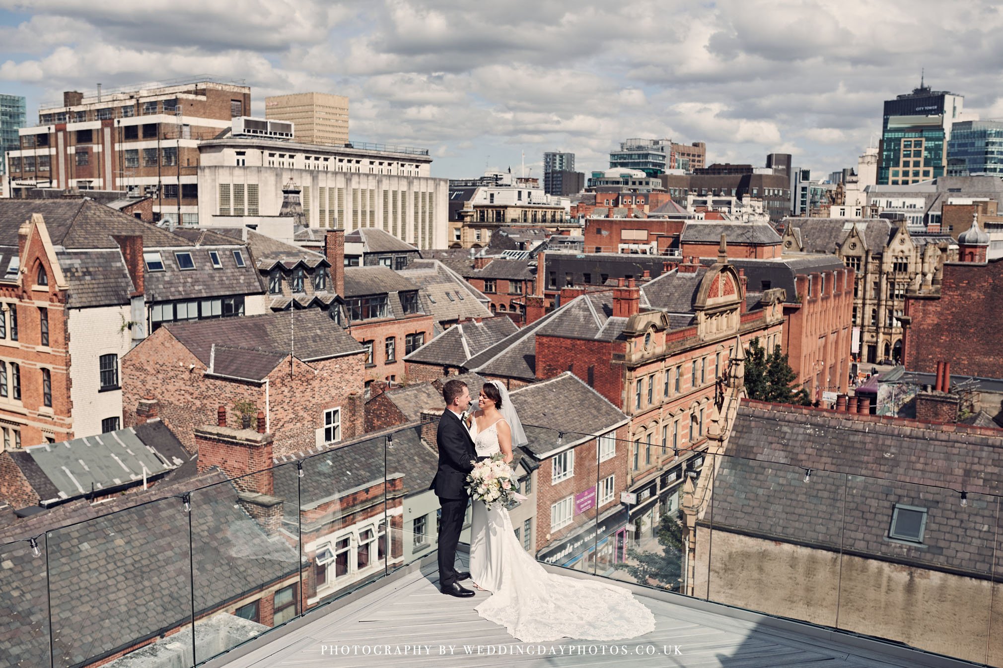 stunning views for married couple on top manchester hall roof top