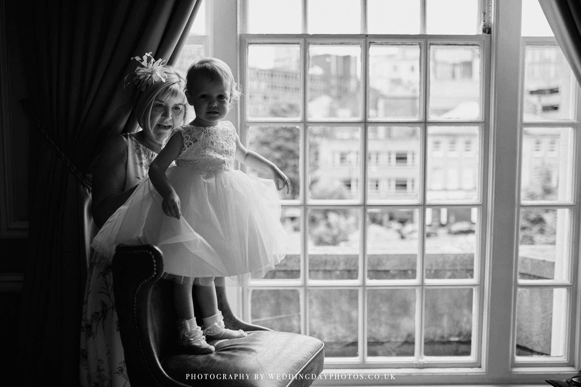 flower girl getting ready at manchester hall wedding