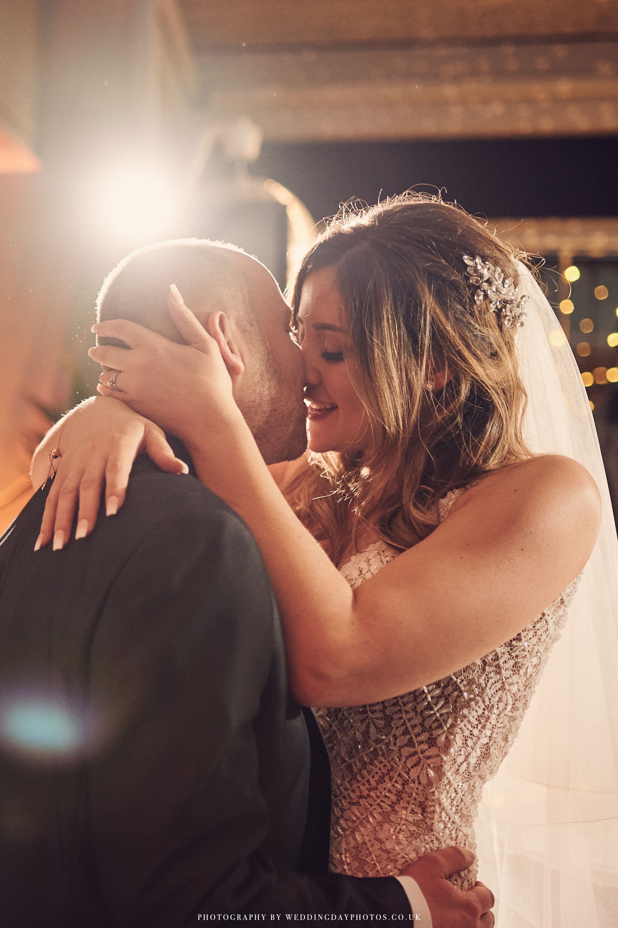 romantic couple on dance floor during wedding at manchester hall