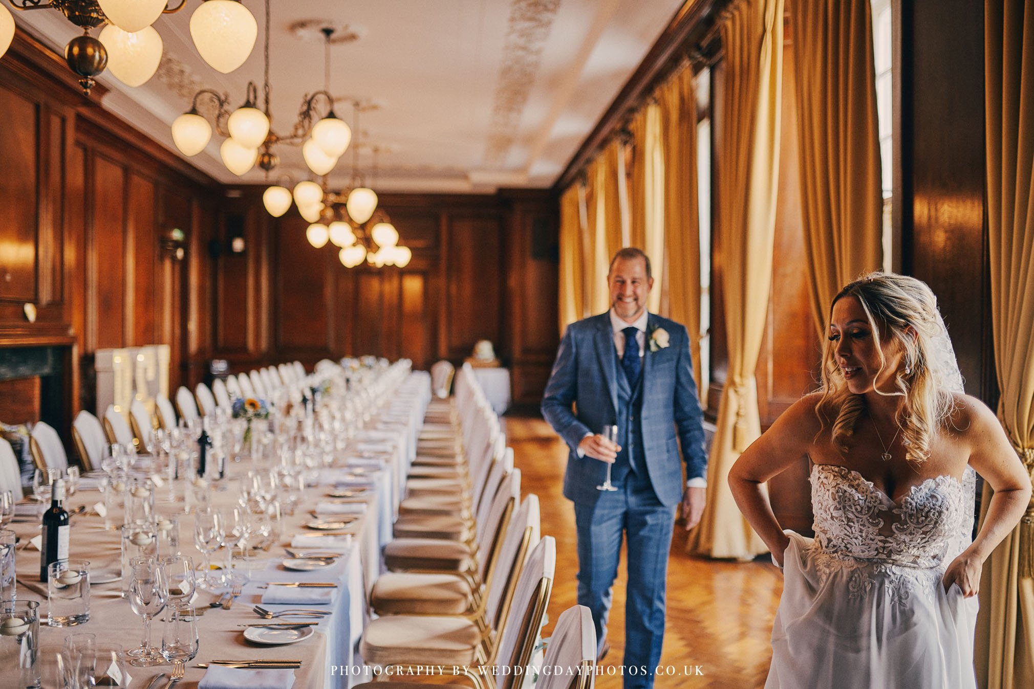 bride and groom viewing their beautifully decorated banqueting room at manchester hall