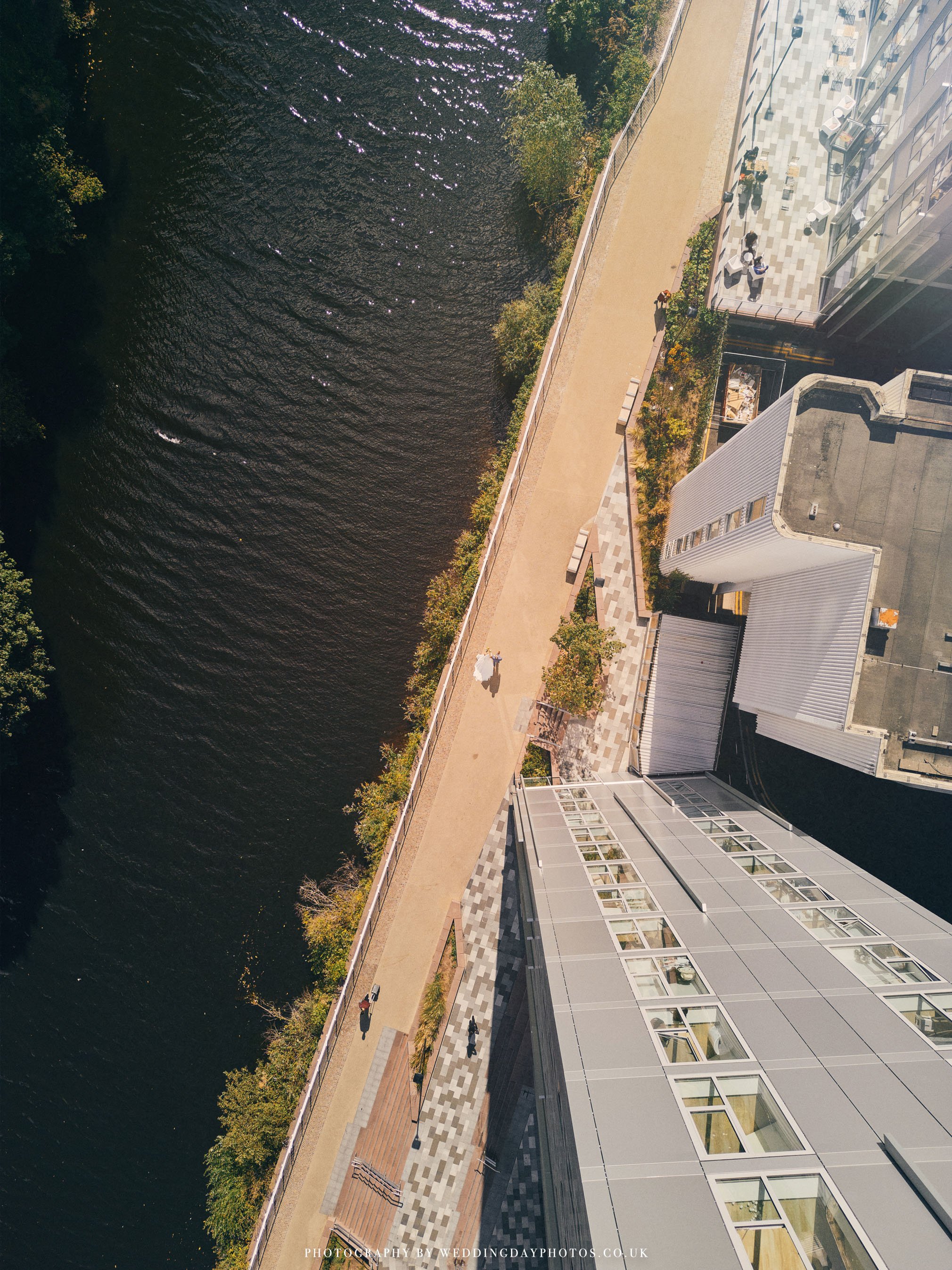 wedding drone photography taken over the river irwell in manchester near manchester hall