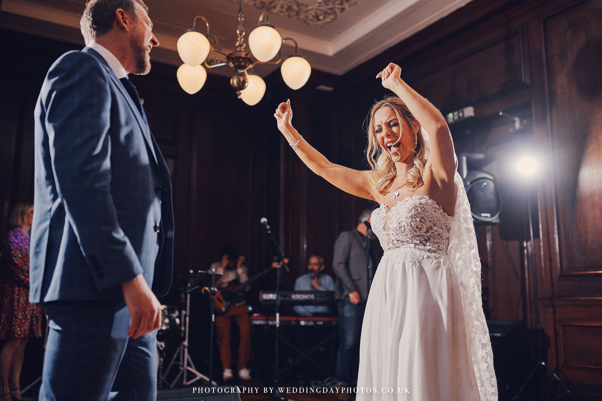 bride and groom dancing in the gallery at manchester hall