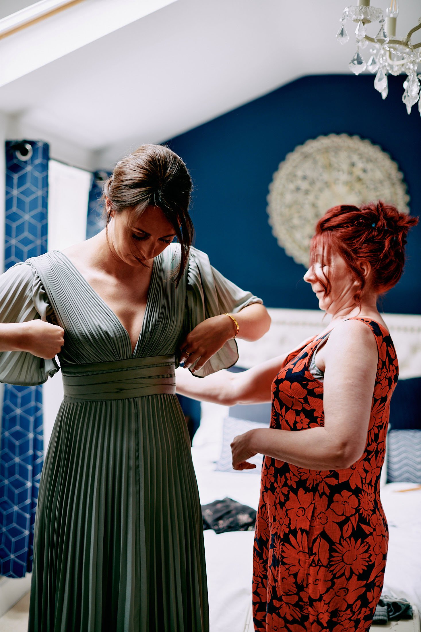 bridesmaid adjusting dress