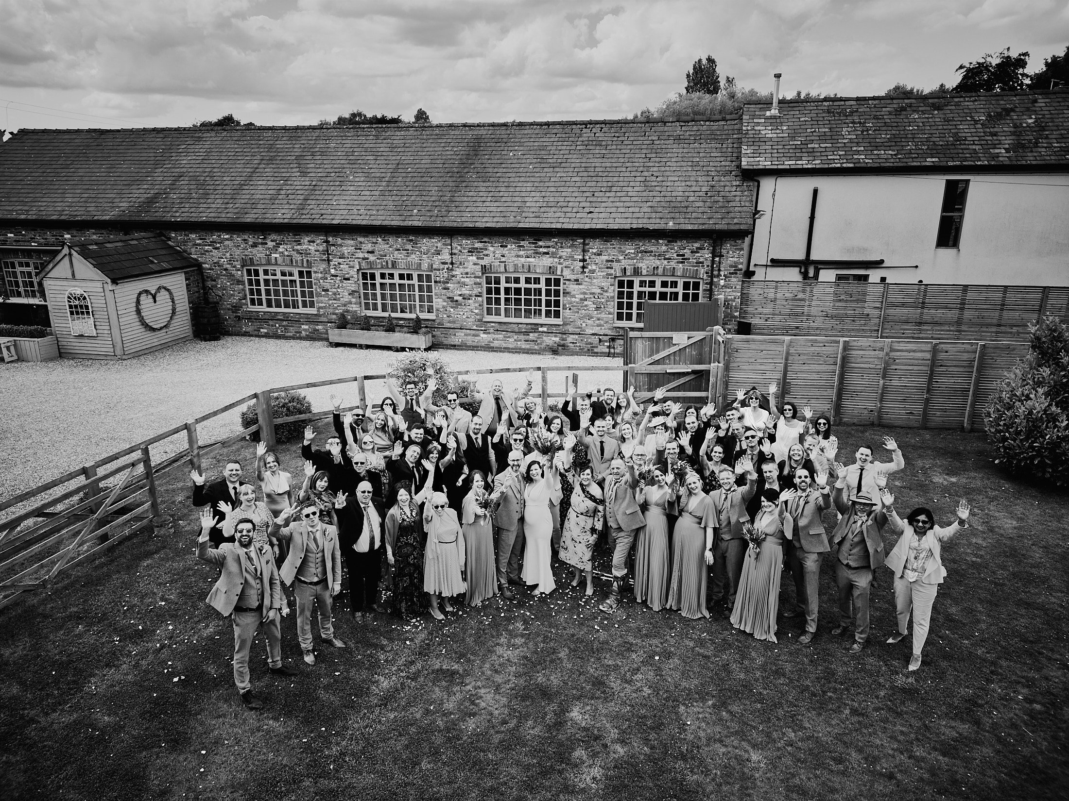 large group photo during wedding at Larkspur Lodge