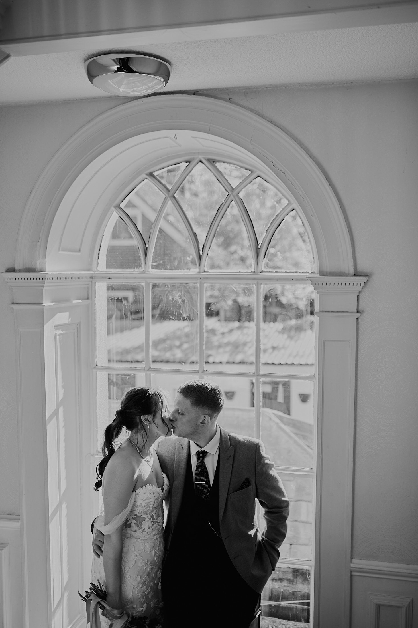 couple portrait in widows at sparth hall