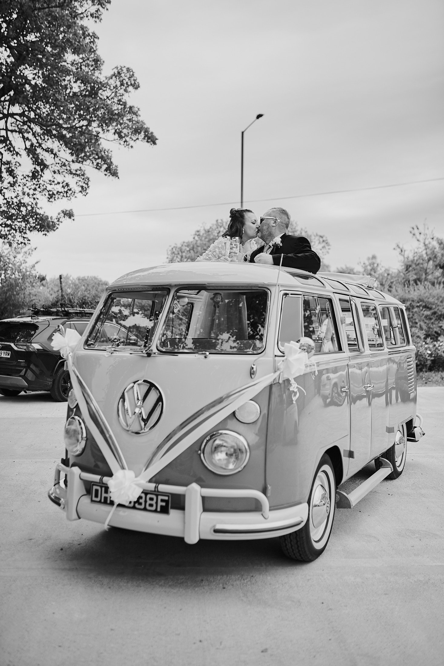 vw camper van with wedding couple
