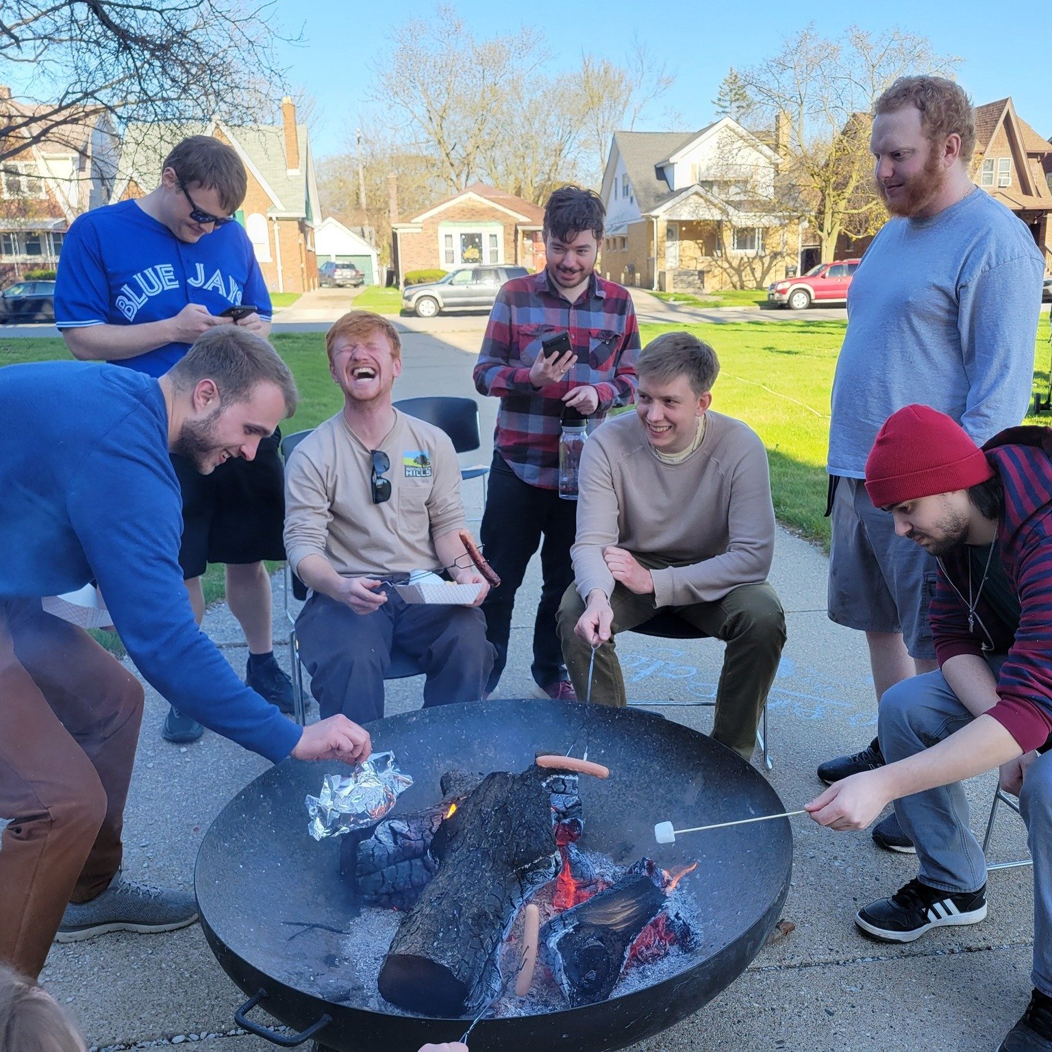 A crowd of Young Adults gathered on the front lawn of Saint Mary of Redford last Saturday as volunteers took turns manning the St. Vincent de Paul Clothing Drive truck in the Parking Lot. We roasted hot dogs, played games, and interacted with the com