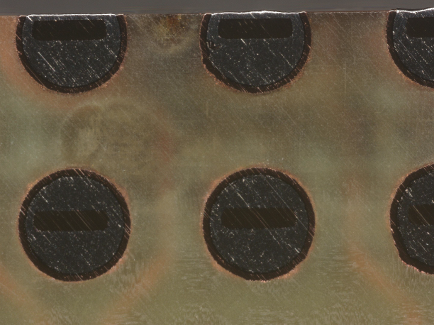 Lap down layer showing micro voids.