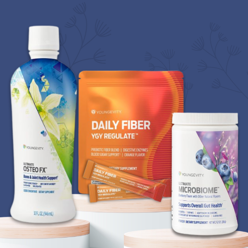 Supplements and health products, including a bottle of Youngevity Osteo FX, a package of Youngevity Daily Fiber, and a container of Youngevity Microbiome probiotic powder on a blue background.