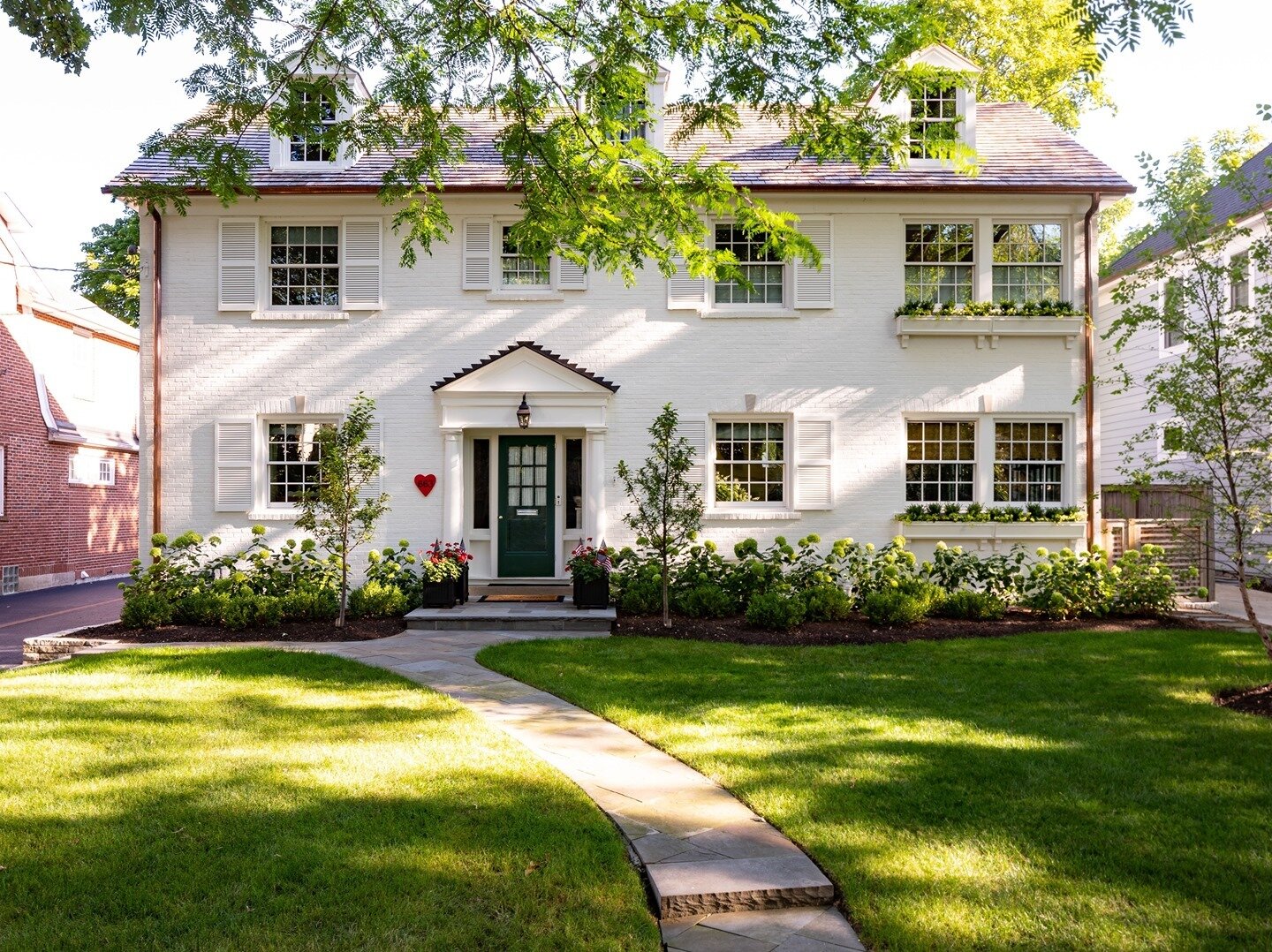 Spring views are almost here! Nothing says spring to us like a beautiful lawn and a blooming garden. We are counting down the days until we can get outside!⁣
⁣
Design by @mlavenderinteriors 
Photo by @janetmesicmackieinteriorphoto