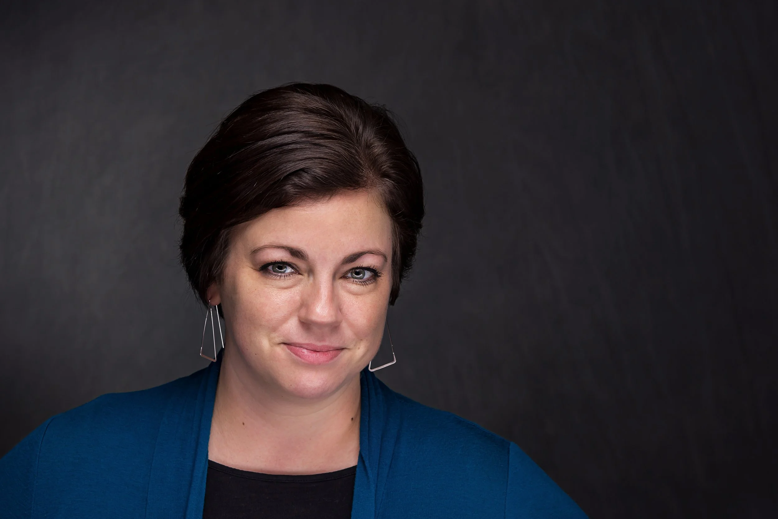 Corporate Headshots Near Me: Should You Bring a Photographer to the Office?