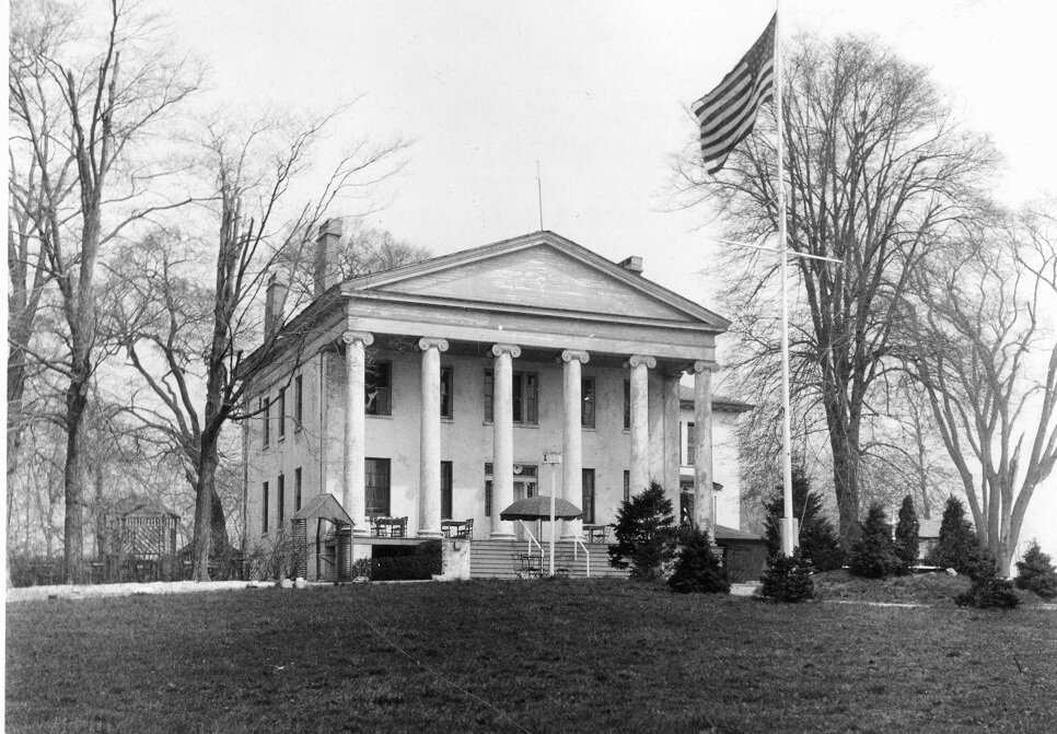 Hawkswood. Built by Elisha W. King, 1829. Greek Revival style. Later called Marshall Mansion for next owner, Levin P Marshall. Eventually became Colonial Inn. Demolished in the 1930s. (Photo: NYC Parks Archive)