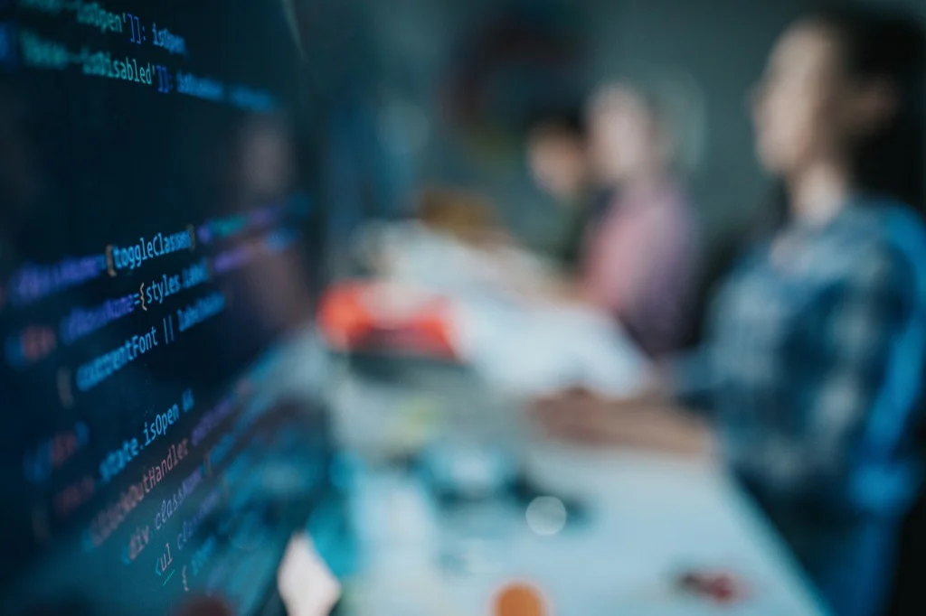 close-up-of-software-codes-on-computer-monitor-in-the-office-picture-id1133672648.jpg