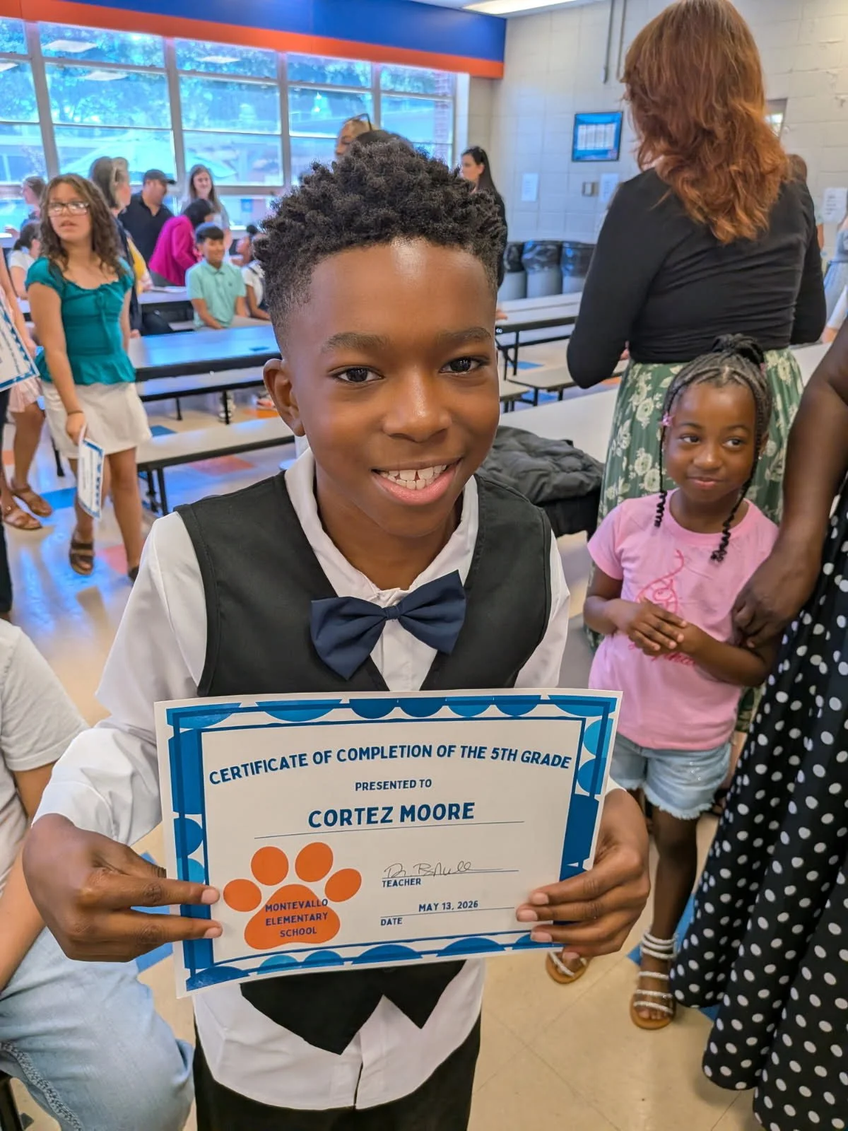 Cortez Moore 5th grad MES graduation.jpeg