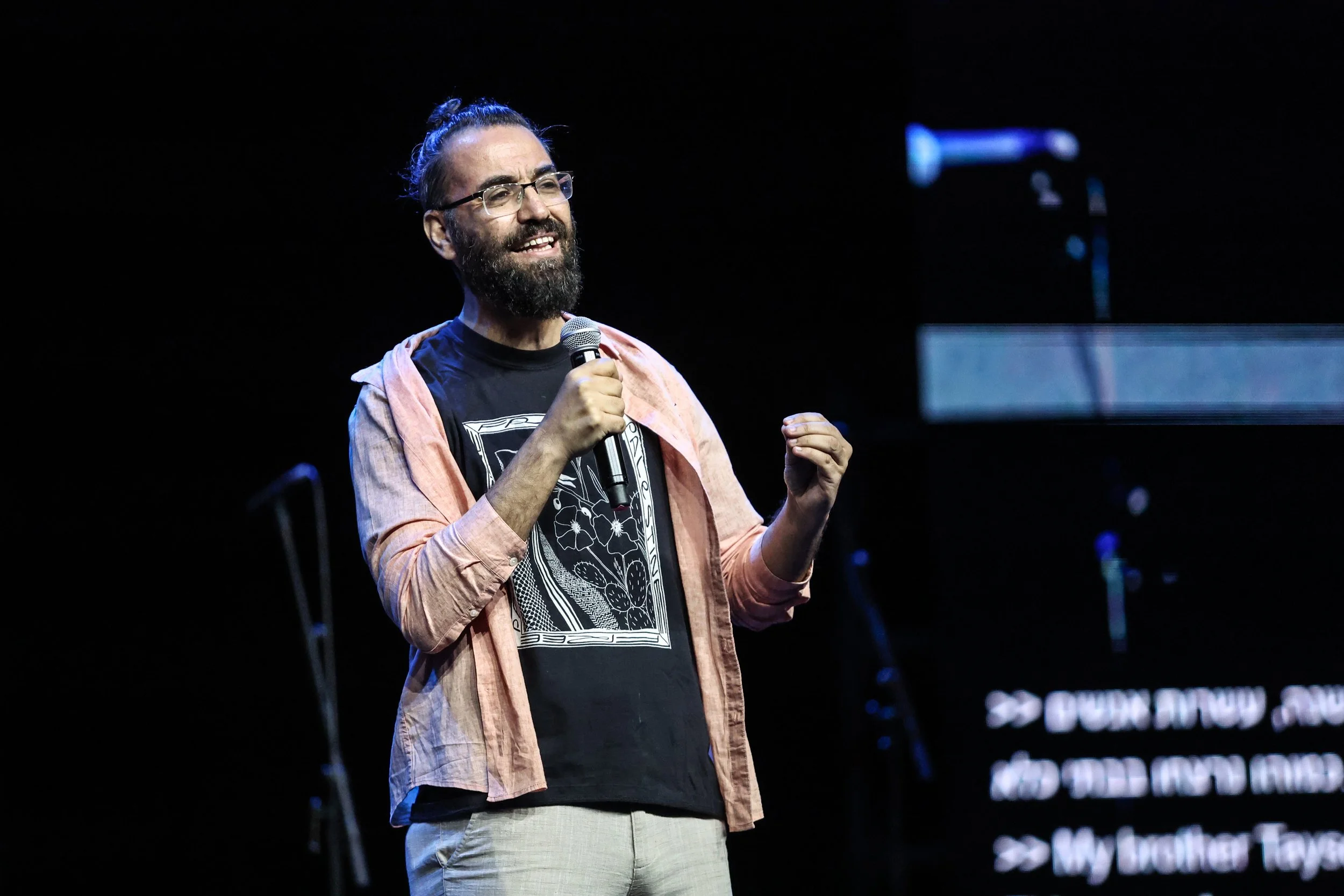 Aziz solo speaking.JPG