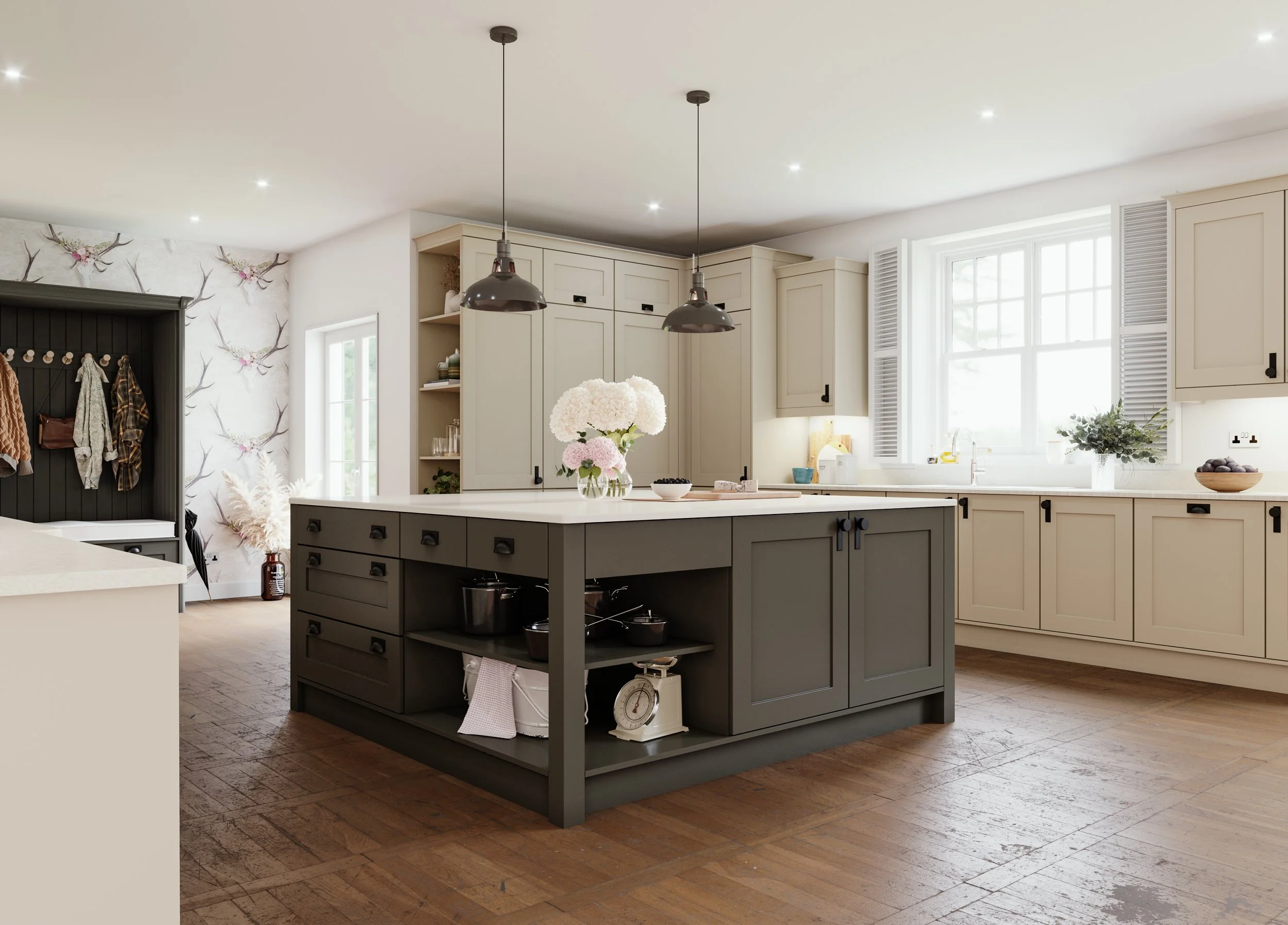 Modern kitchen with light-colored cabinets, a large window, and a central island with a flower arrangement. Hanging pendant lights above the island, wooden floor, and decorative wallpaper with antler and bird motifs on one wall.