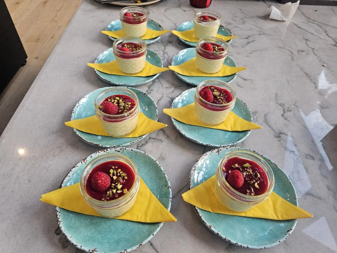White chocolate mousse with raspberry sauce and pistachios.jpg