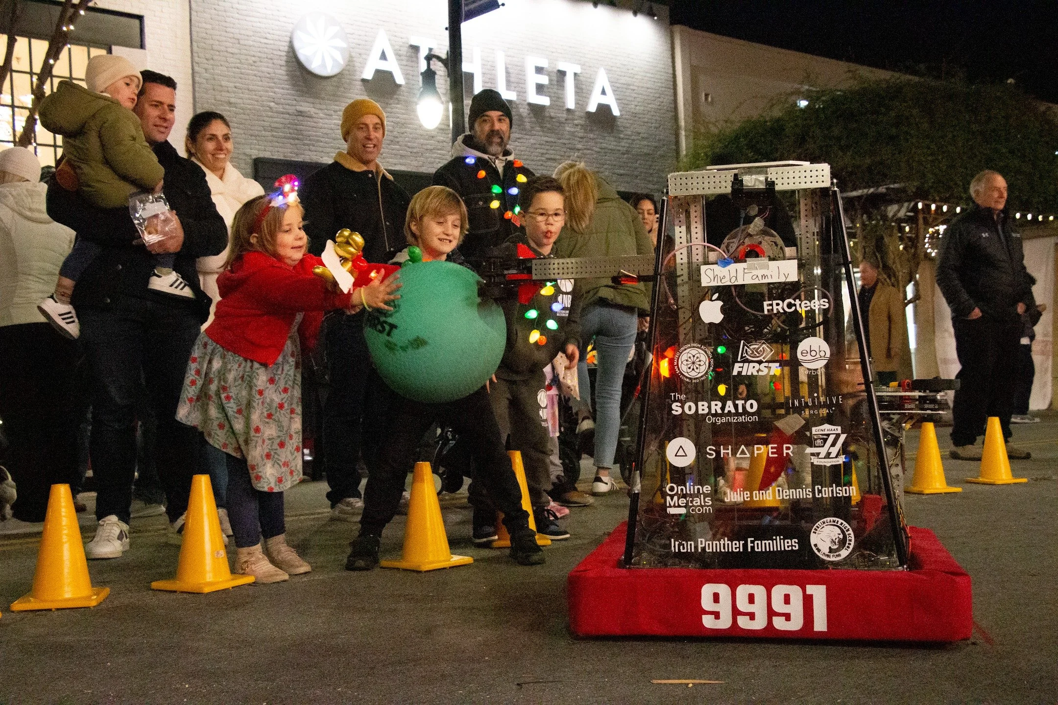 Last Friday the Iron Panthers attended Burlingame&lsquo;s annual Winterfest and tree-lighting ceremony. We had a blast showcasing our robot and talking to the community. Thank you to everyone who supported the team by buying baked goods or participat