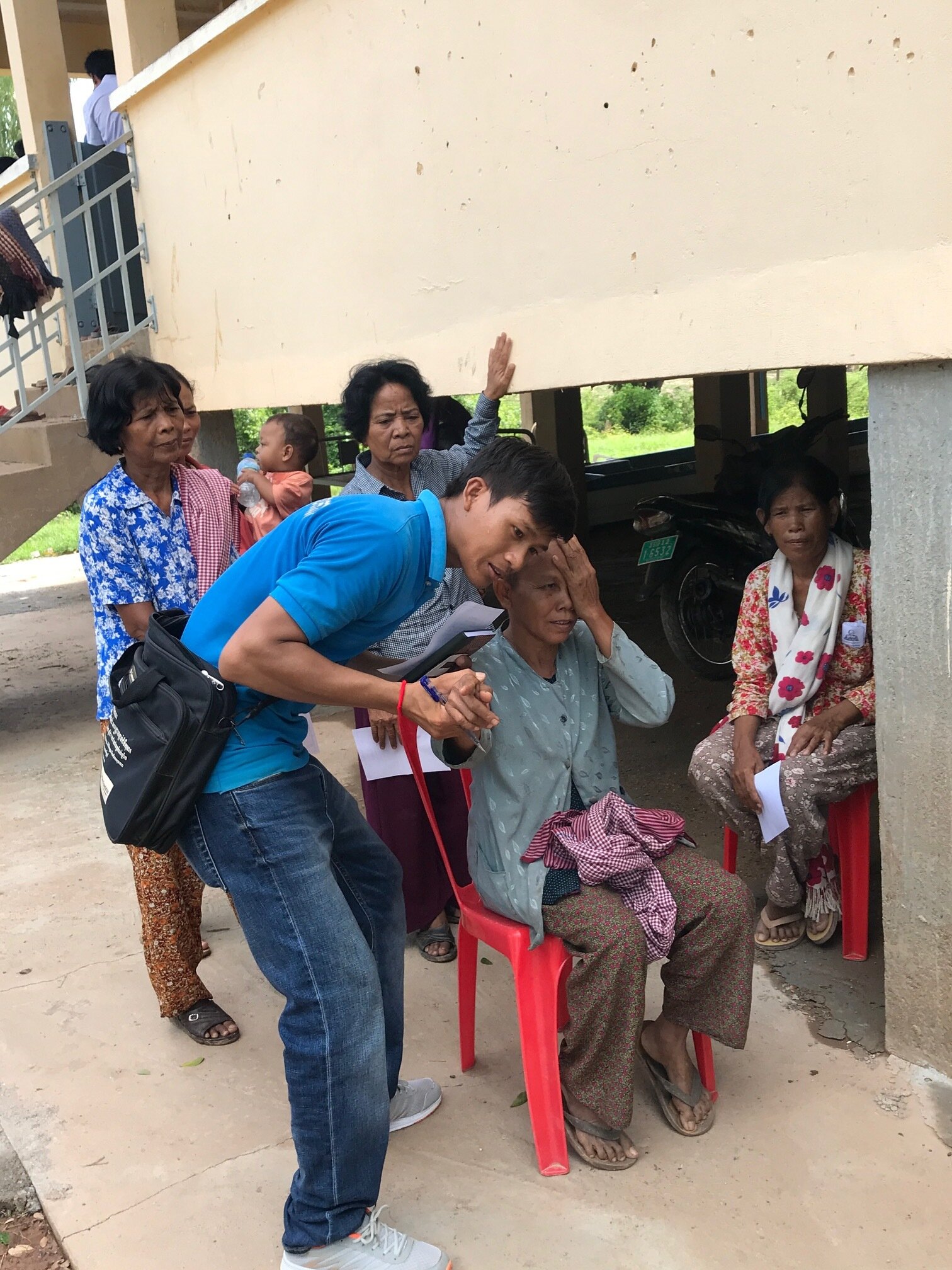 WAH Cambodia Cataract Mission eye testing in village.JPG