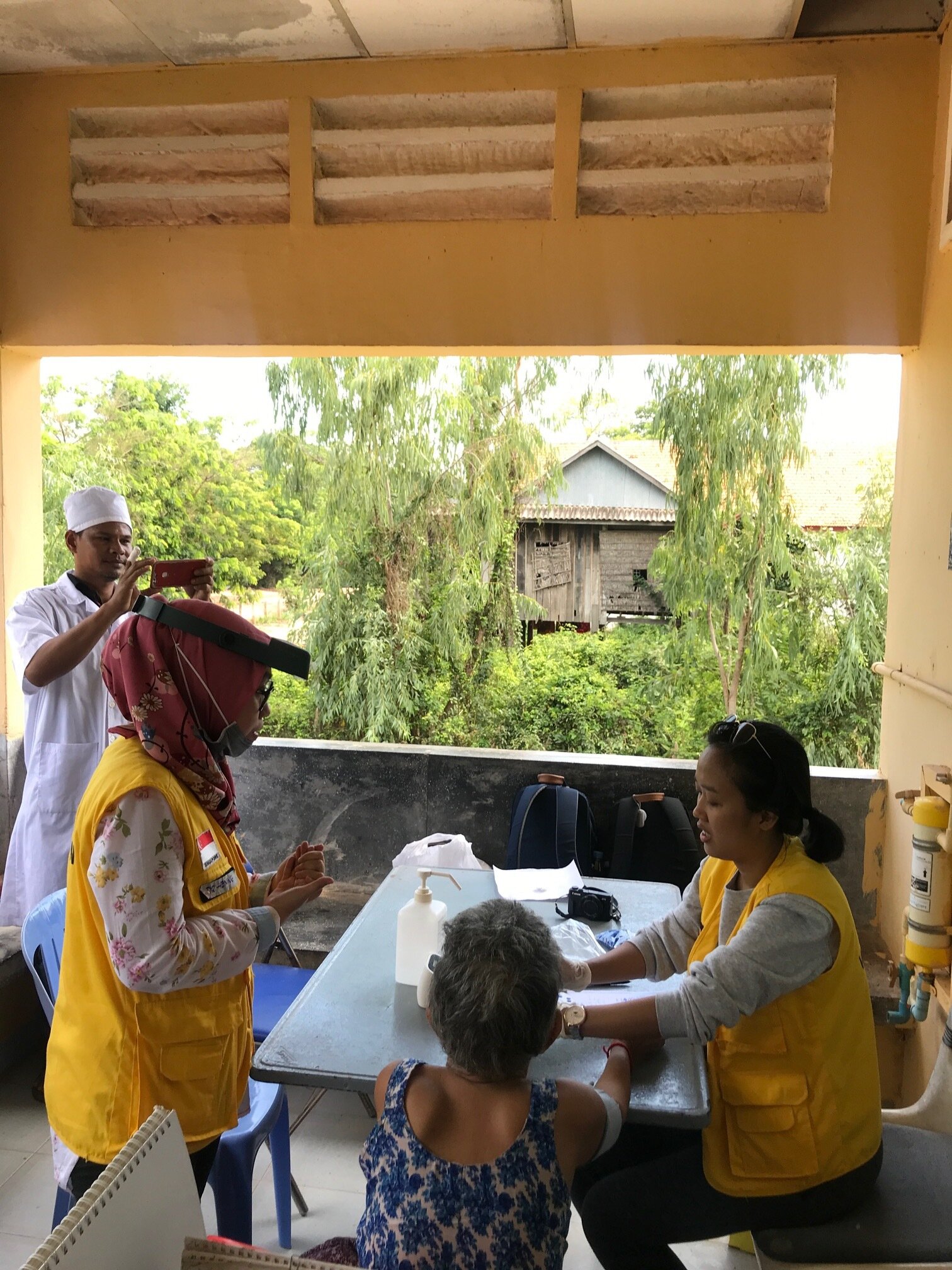 WAH Cambodia Cataract Mission eye test villafge prepping.JPG