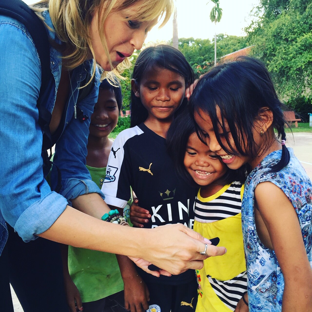 WAH Cambodia orphanage making new friends.JPG