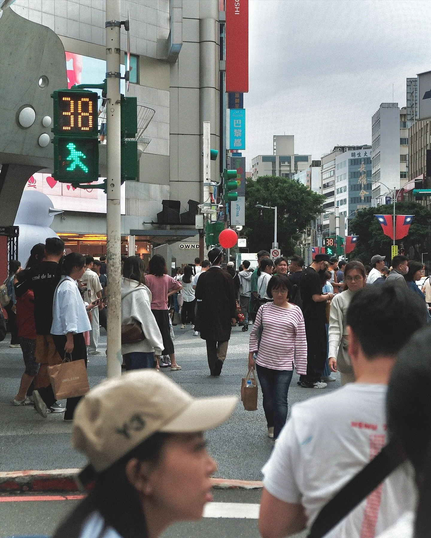 Street scenes from Taipei. 

Taiwan&rsquo;s capital moves with quiet poise, balancing tradition, creativity, and self-assured independence. Heritage buildings sit beside minimalist caf&eacute;s, night markets hum beneath sleek towers, and culture fee