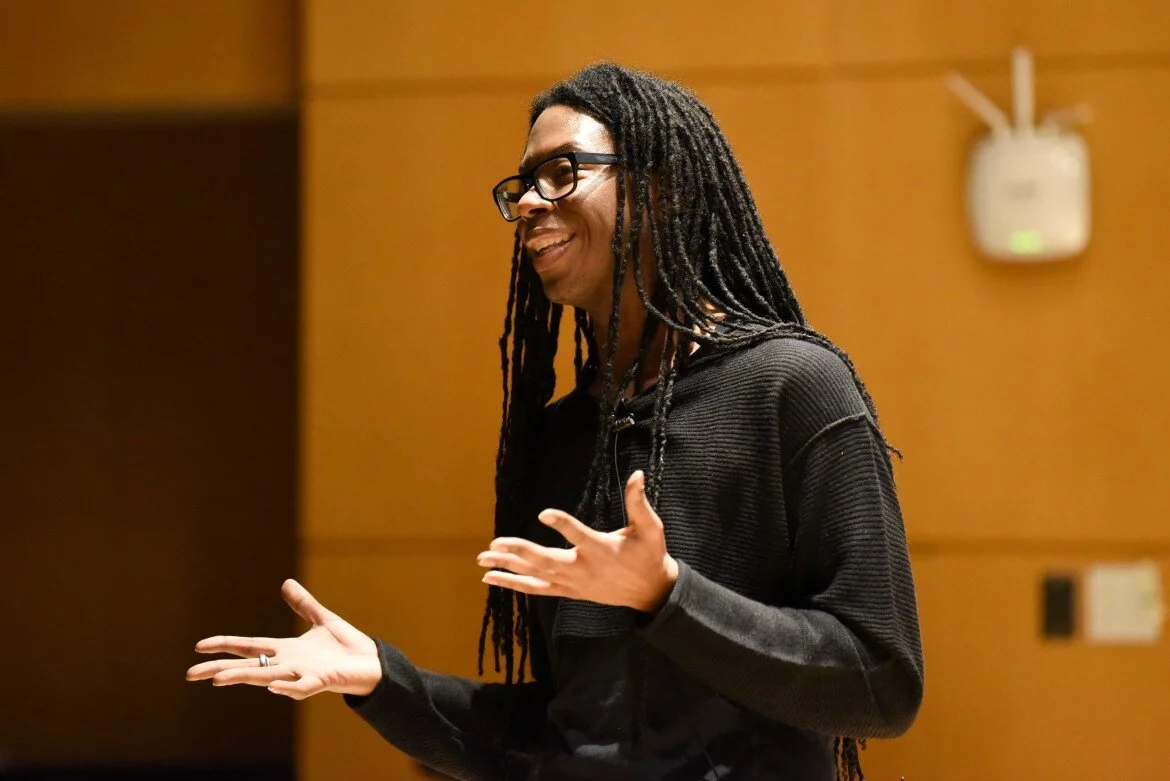 Christopher Sebastian, an intersectional vegan animal rights scholar, giving a presentation on veganism as a way to combat race-based violence.jpg