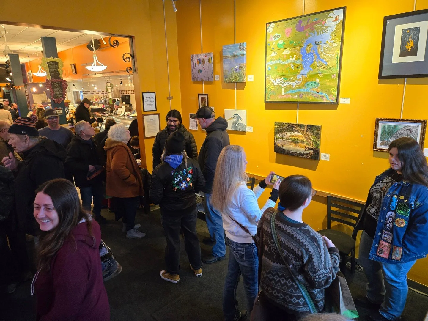 Thank you to everyone who joined us for the opening reception of The River Speaks: Art of the Estuary at Wussow&rsquo;s Concert Caf&eacute; last Thursday, March 5. With more than 22 artists featured and a packed room of community members, the evening