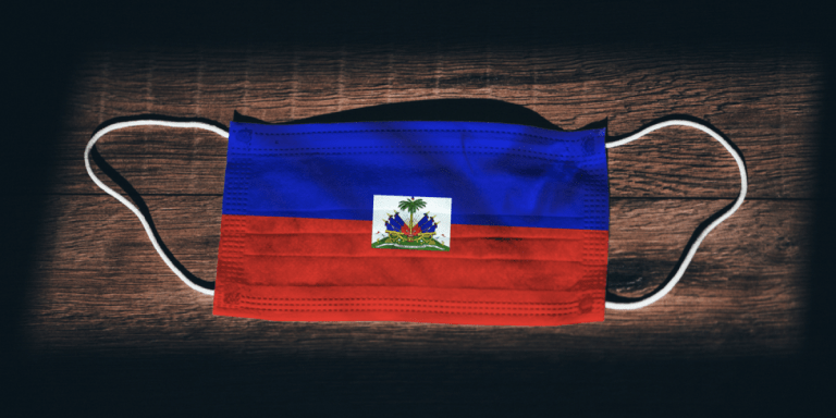 A mask with the Haitian flag on it.