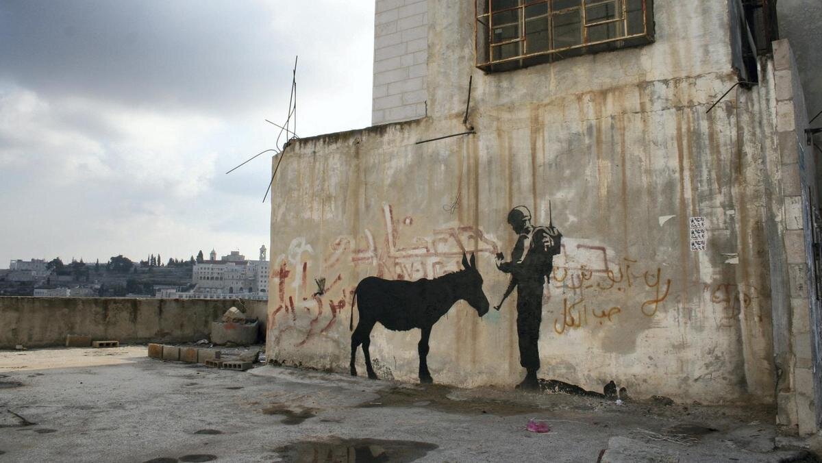 banksy donkey documents palestine