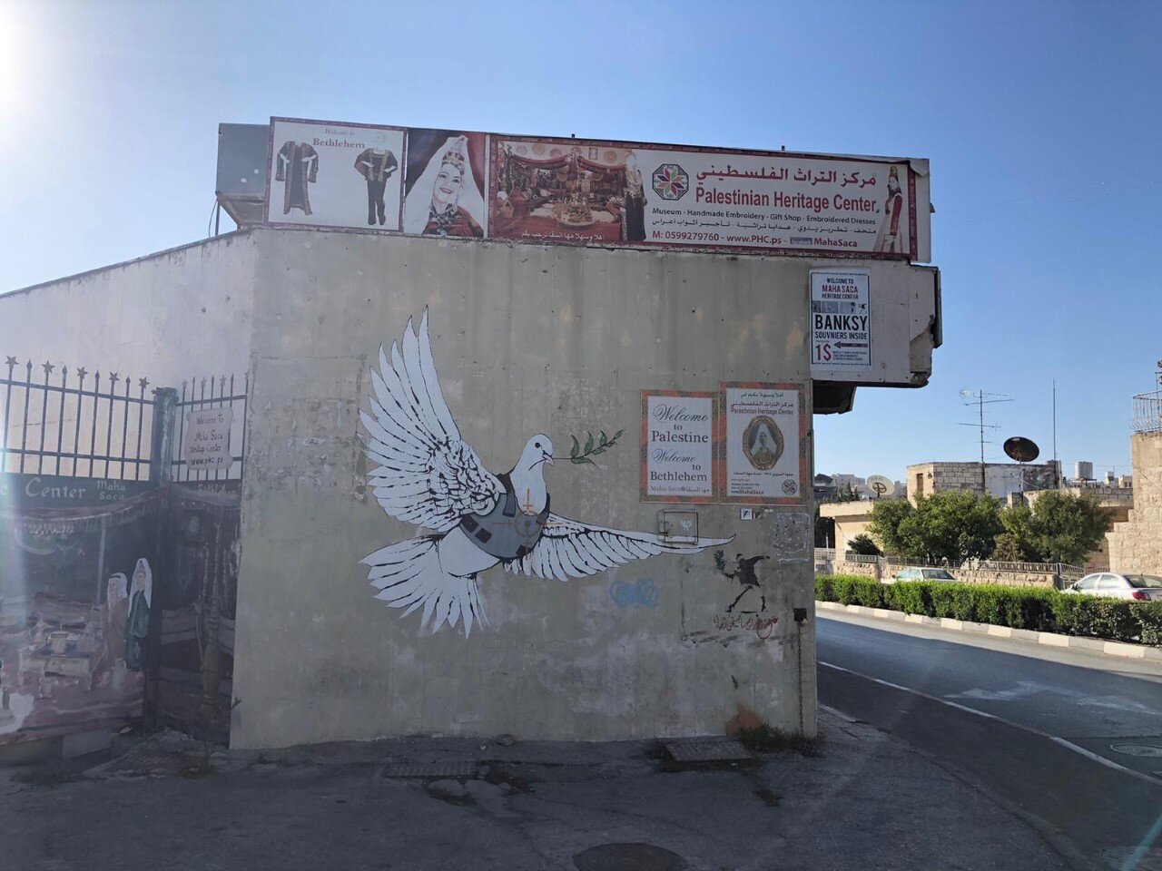 banksy peace dove bethlehem palestine