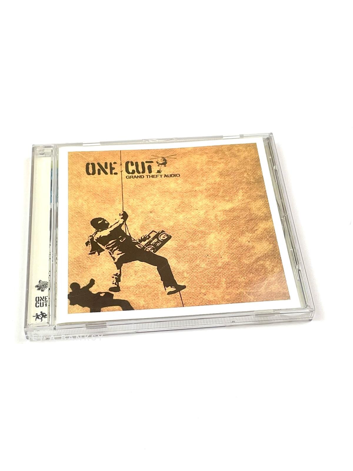 Onecut Grand Theft Audio CD — Get a Banksy