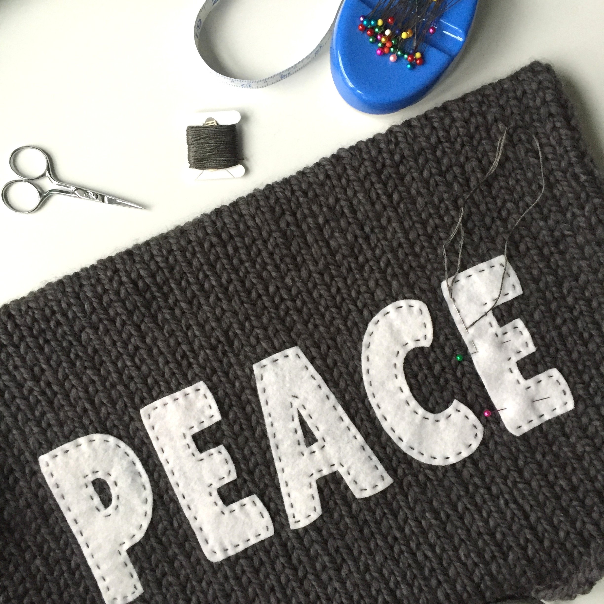 Peace Pillow Cover Knitting Pattern with Felt Applique Letters Chunky Yarn NOV 2021.JPG