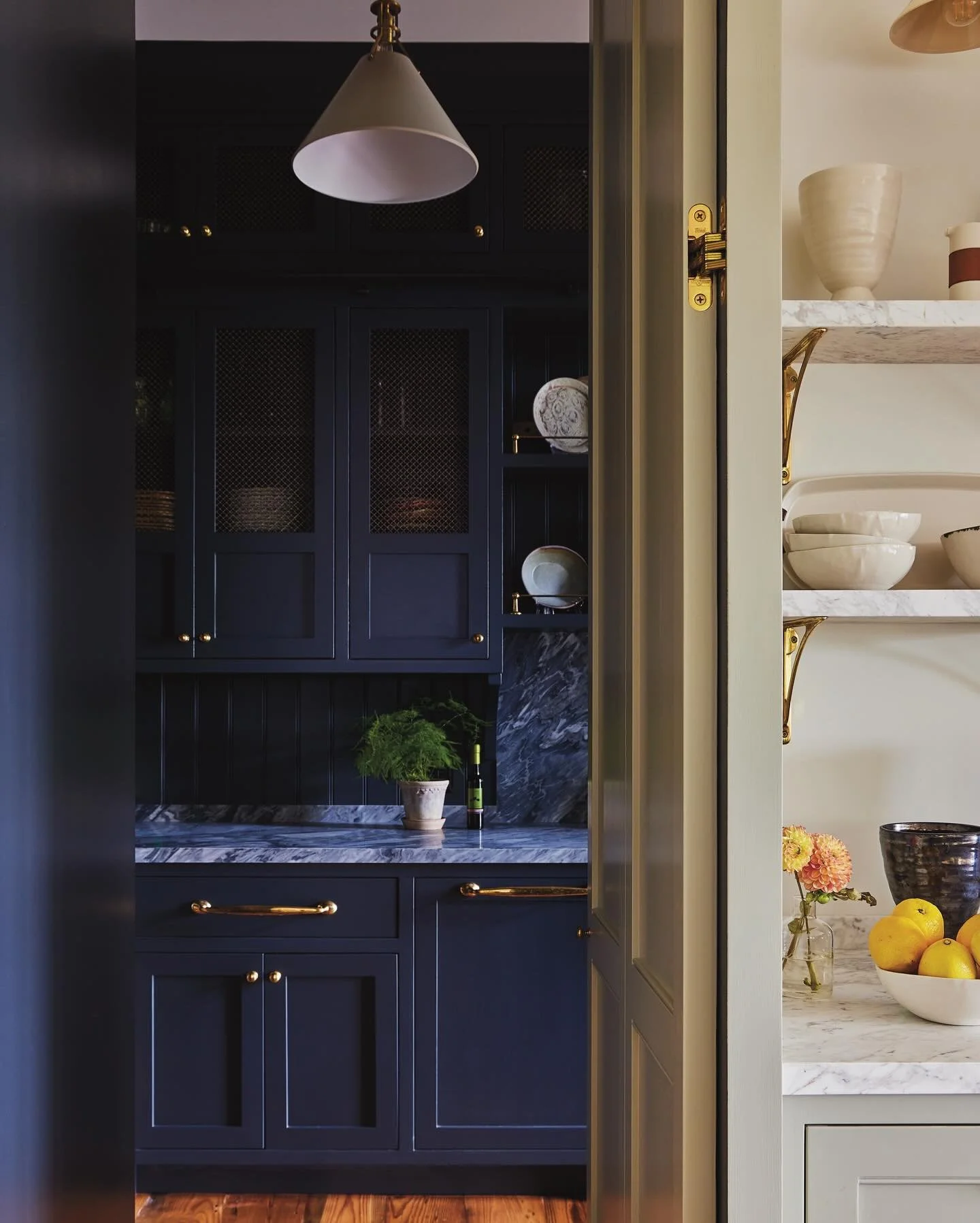At our #LakeWaramaug project, hidden among the cabinetry in the kitchen is a discrete door to the back kitchen behind. We wanted to do something a little bolder in the back-kitchen so it didn&rsquo;t feel like an afterthought. We chose @farrowandball