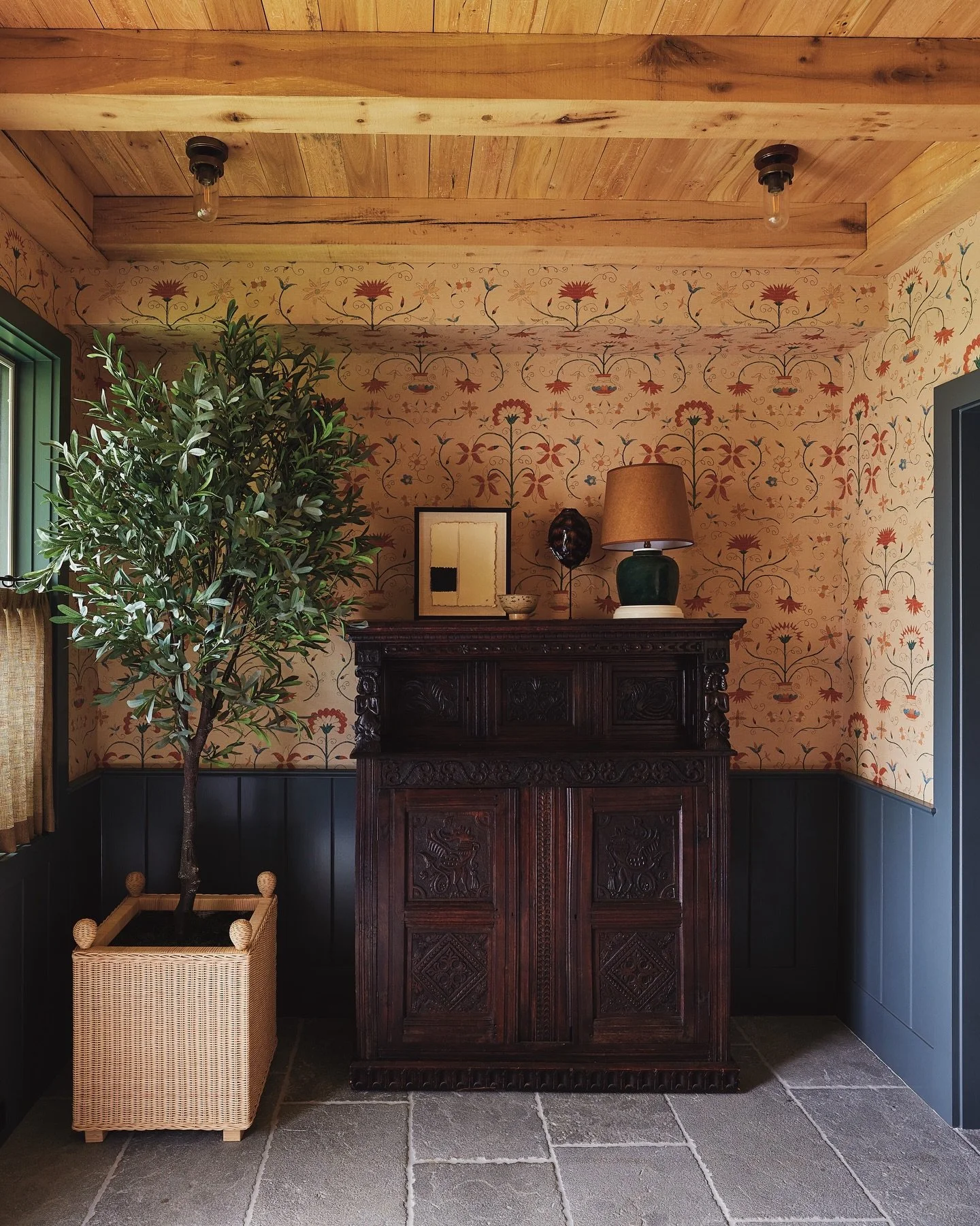 The making of the mudroom at our #LakeWaramaug project, where the wallpaper from @robertkime is paired with the perfect contrasting paint from @farrowandball, and a reclaimed wood antique bench.
⠀⠀⠀⠀⠀⠀⠀⠀⠀
As featured in @houseandgardenuk. Photo: @kat