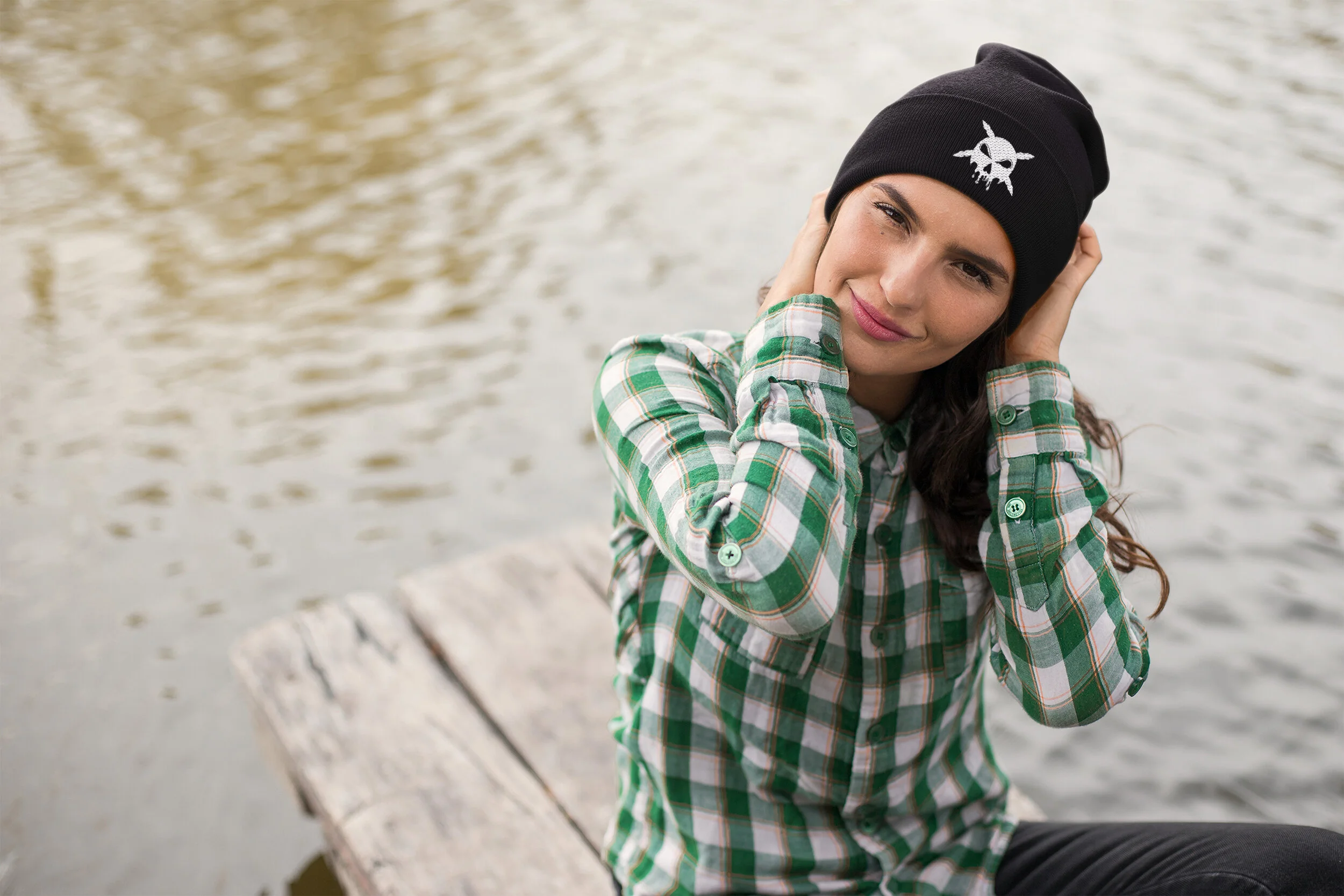 woman sitting by lake wearing beanie JPEG 300 DPI.jpg