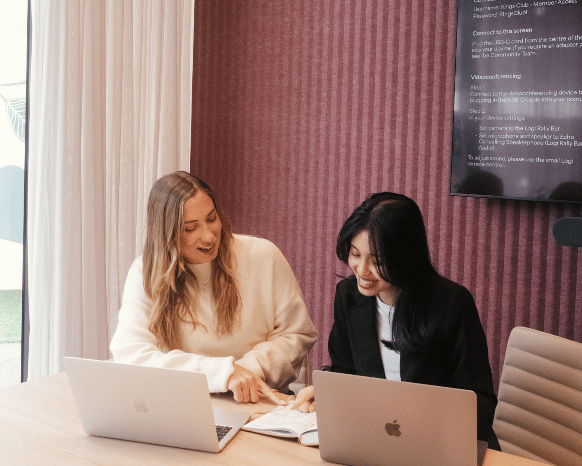 two social media managers working on an account