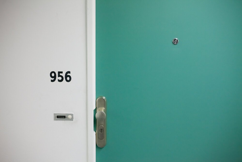 White Door | teal Wall | Door with Lock | Compulsions | OCD.jpeg