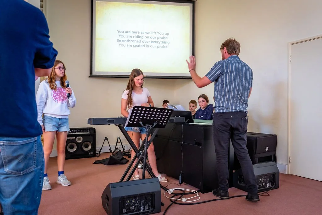 Young people rehearsing music together at Cottesloe Youth.