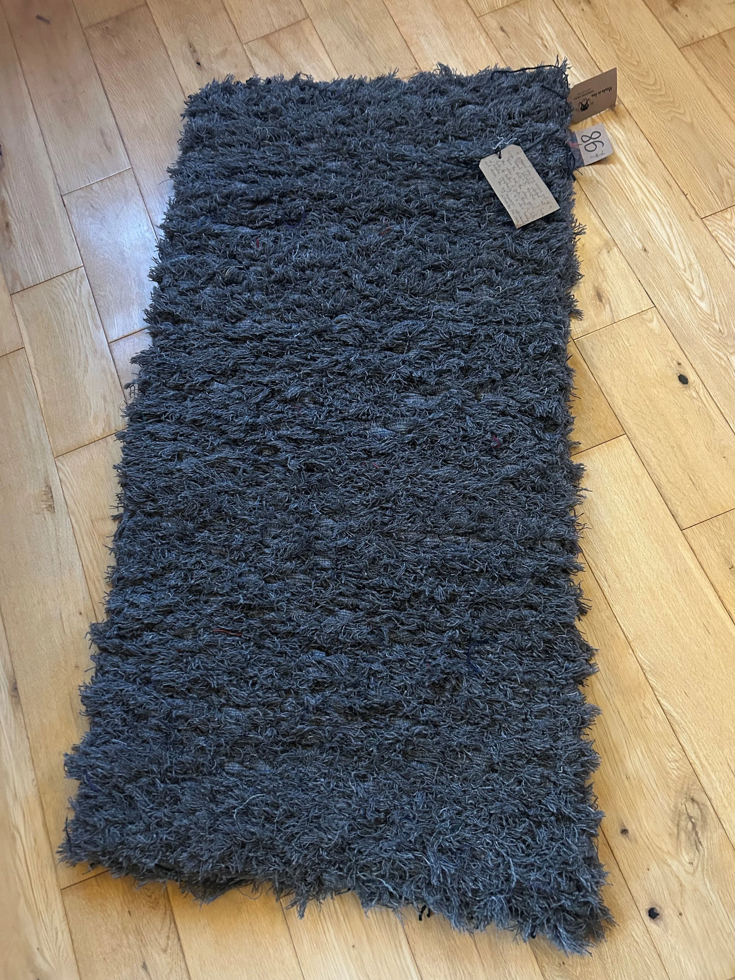 A Gorgeous Handwoven Grey Wool Rug
