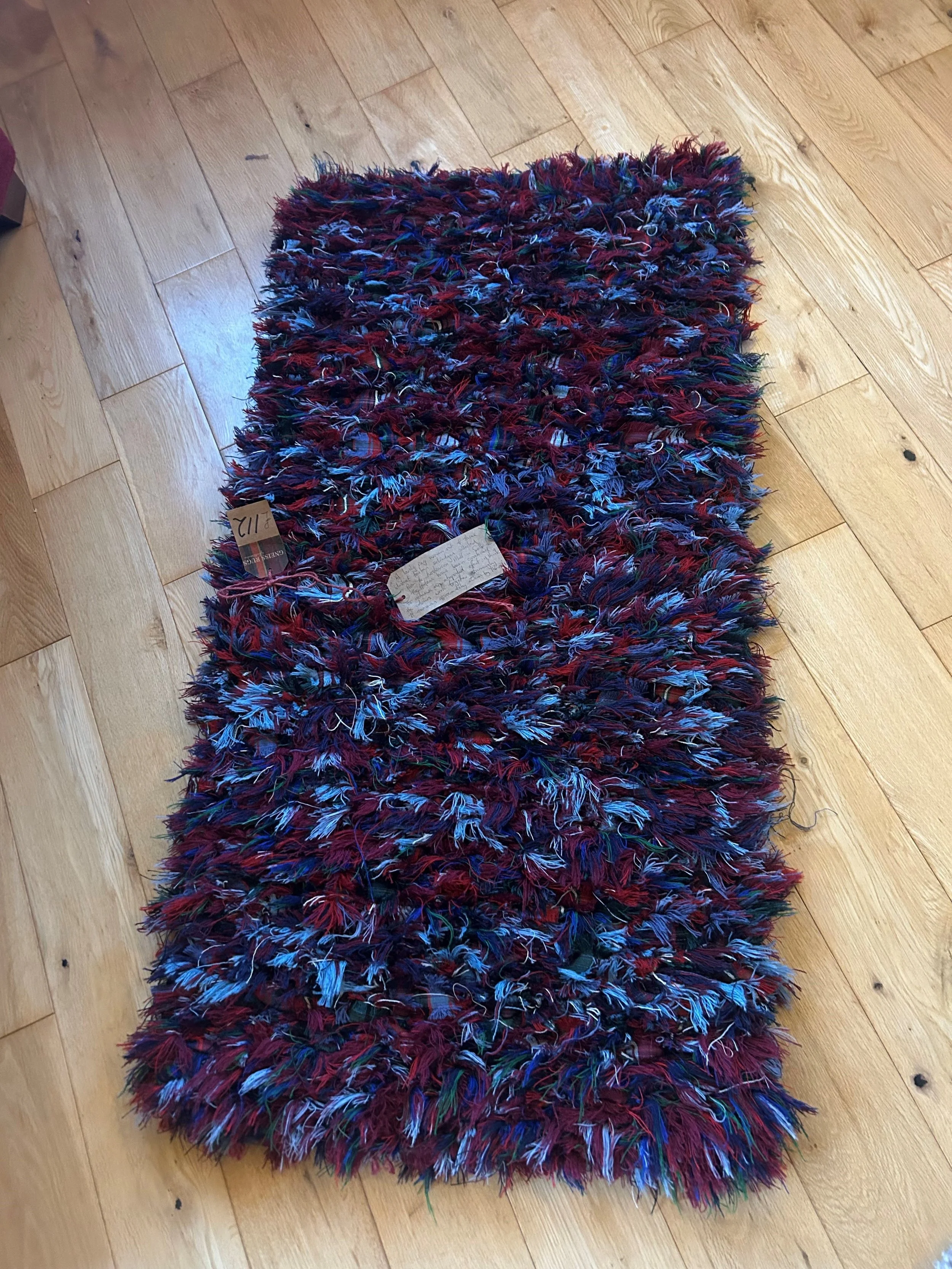 A Lovely Handwoven Tartan Wool Rug