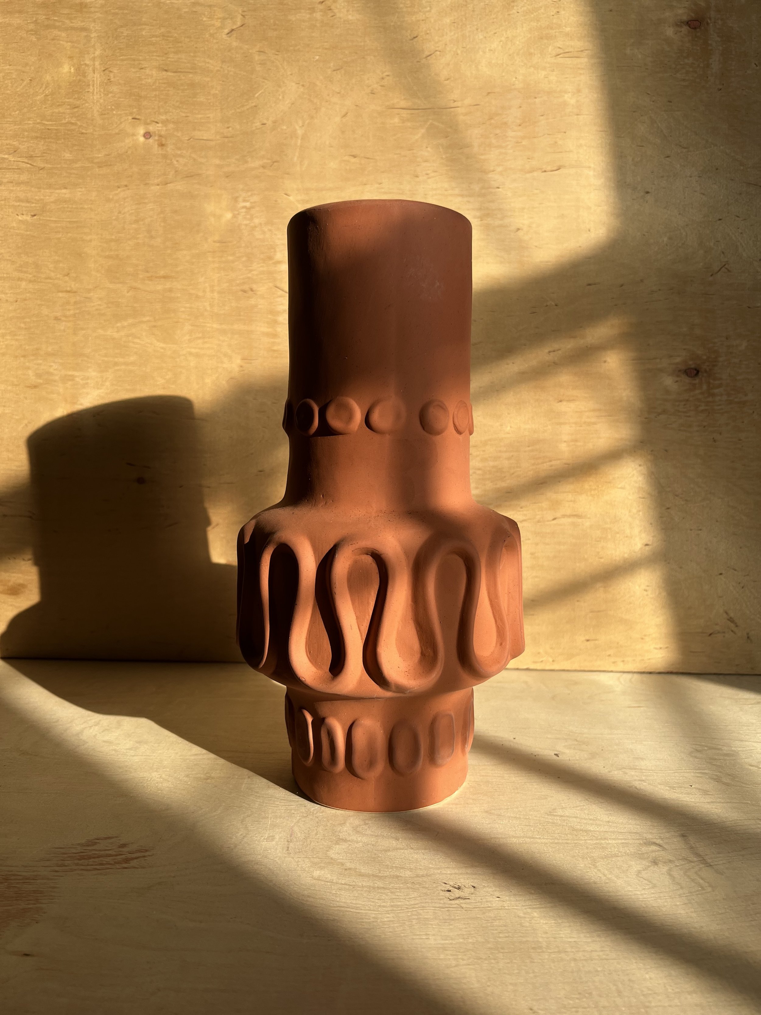 TOO Tall Terra-cotta planter