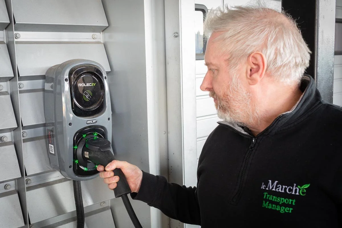 Le Marché Transport Manager charging an electric van