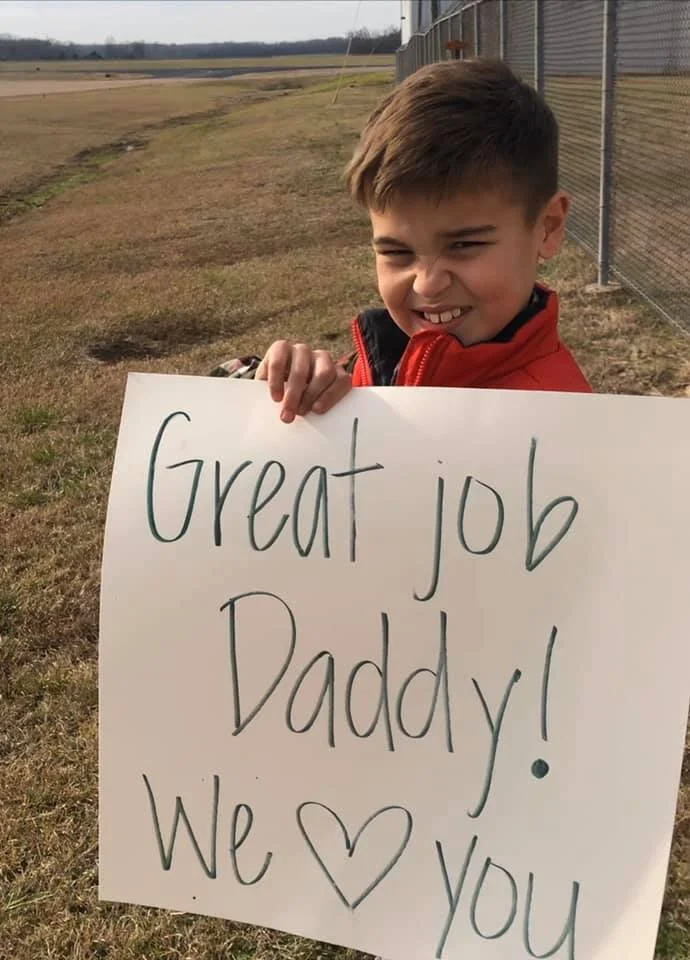 Eric from Tuscaloosa getting congradulated on his first solo Cross Country!