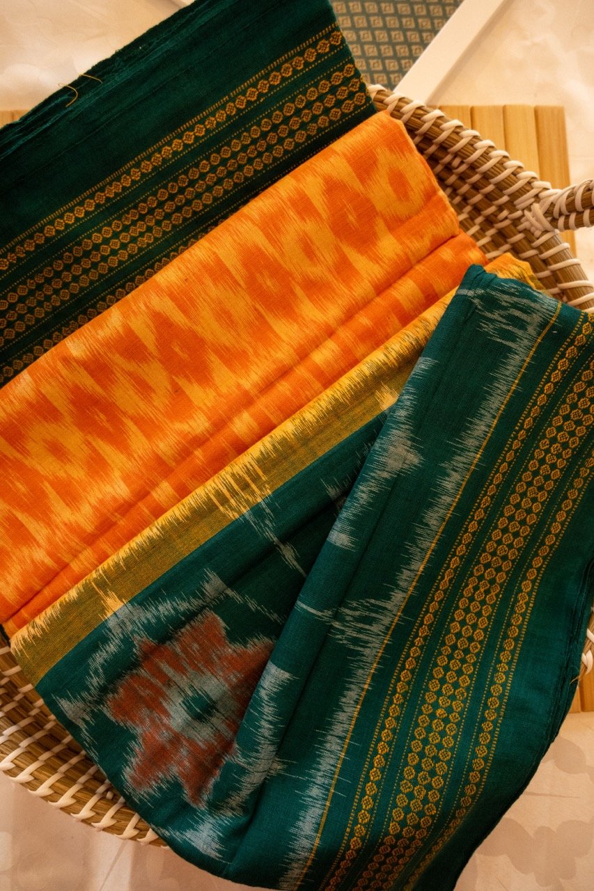 Peacock green with orange border Sambalpuri weave - Nadhi | The Saree Store