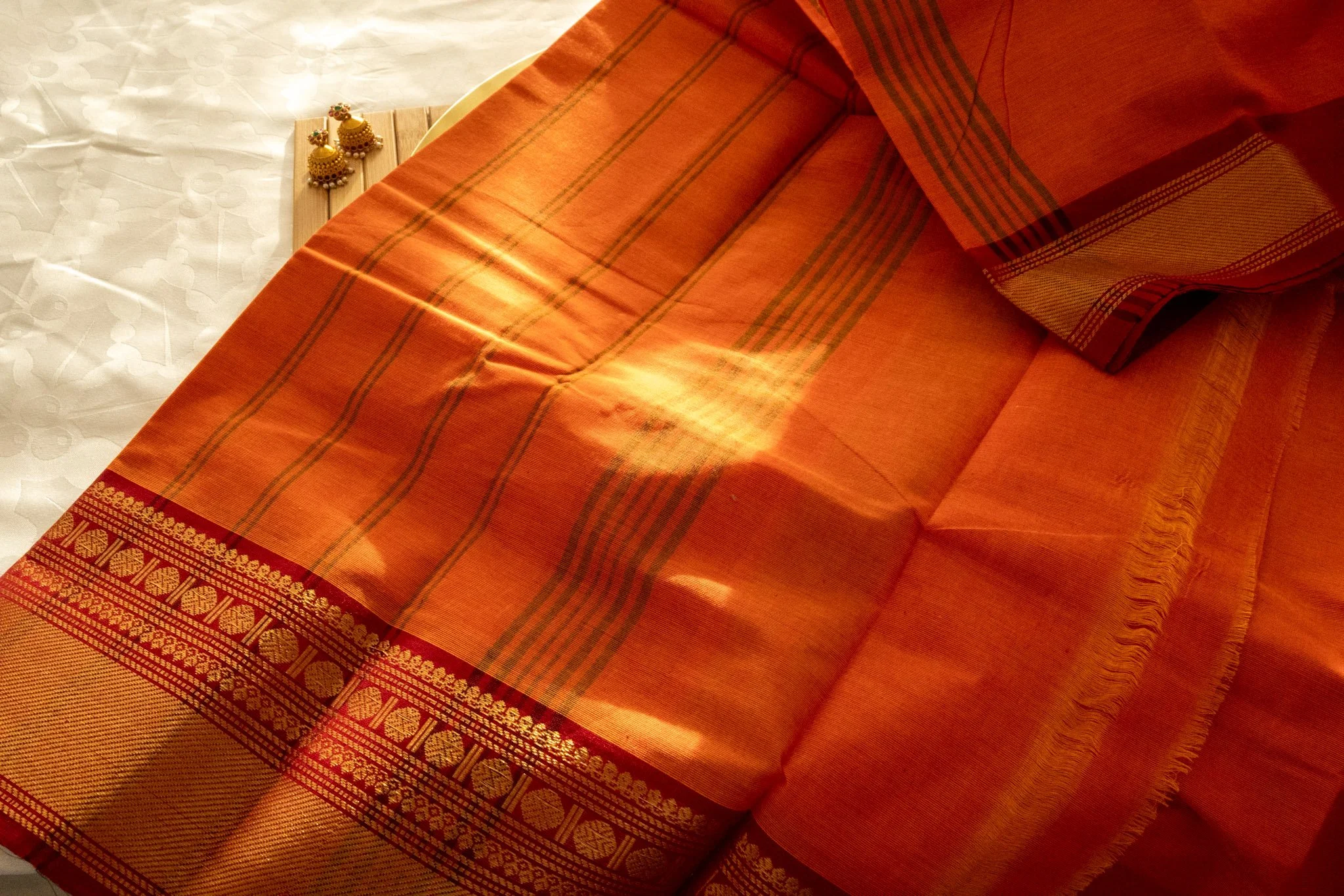 Tangerine orange with red border - Nadhi | The Saree Store