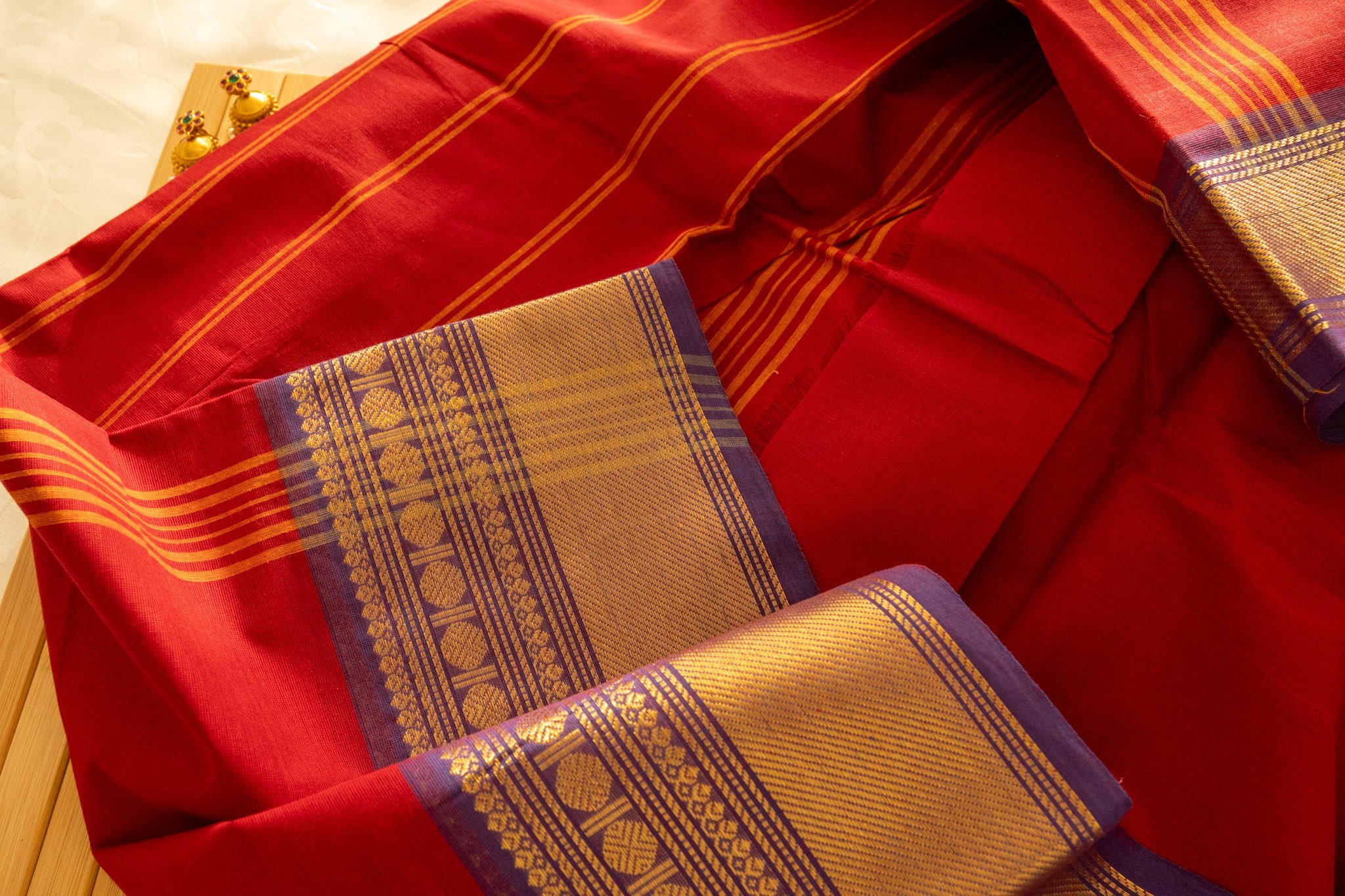 Mexican red with purple border - Nadhi | The Saree Store