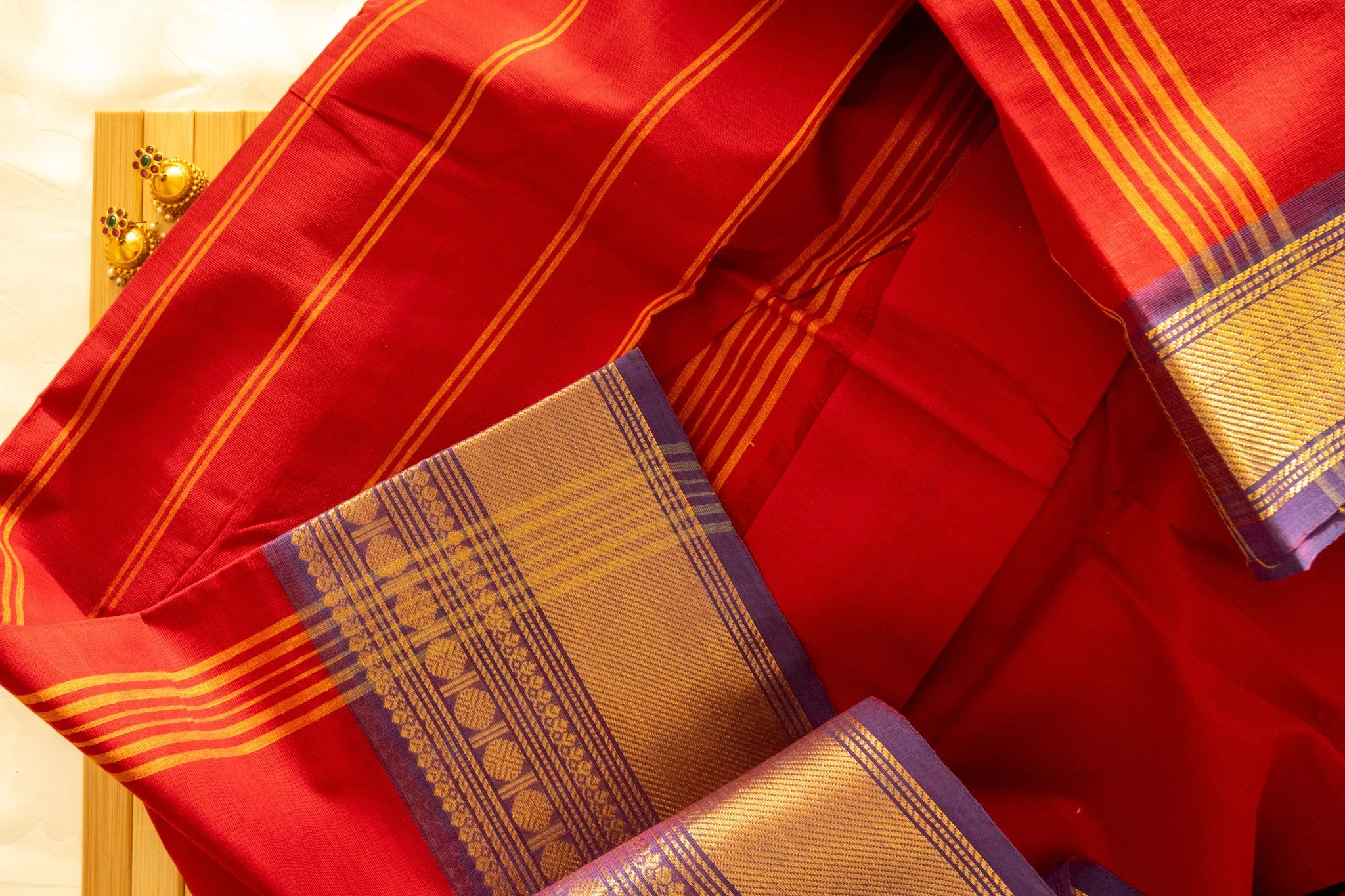 Mexican red with purple border - Nadhi | The Saree Store